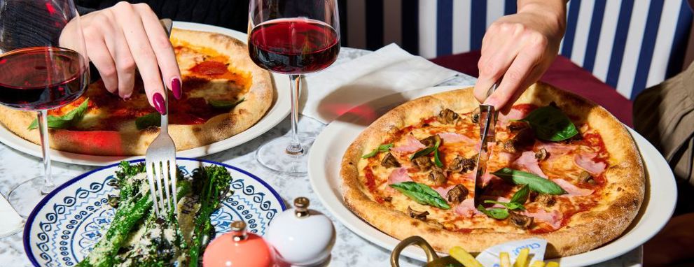 Couple enjoying each other's company at diner